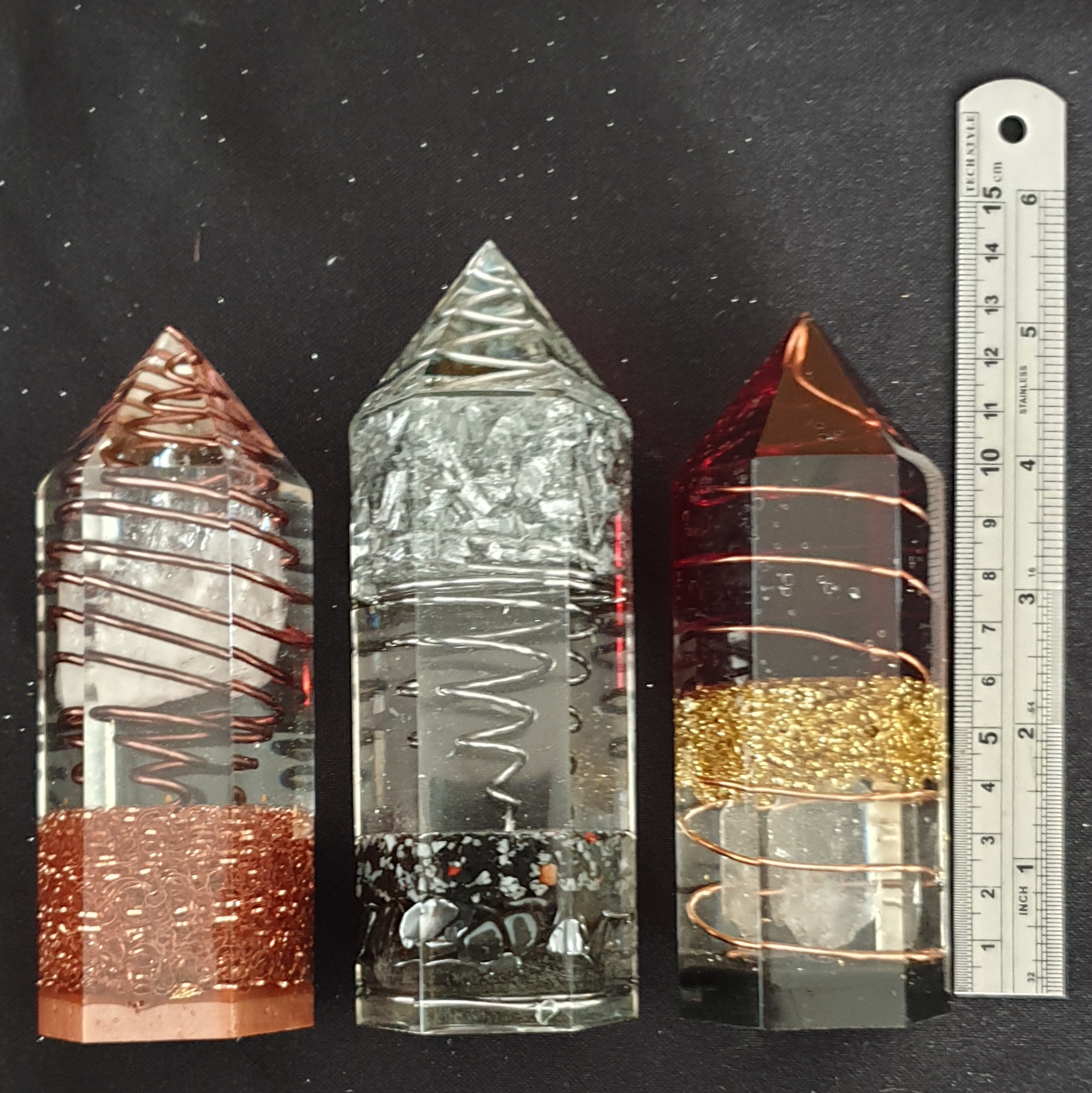 Amethyst and Clarity series orgonite obelisks with copper wire and clear quartz