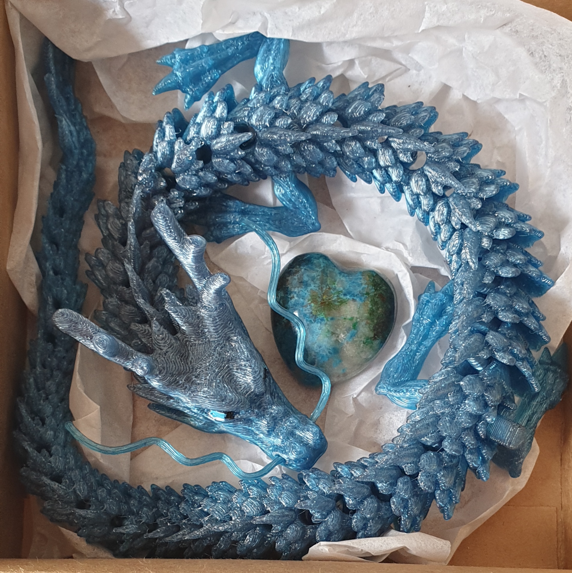 Guardian Dragon Set featuring a crystalline blue dragon cradling a labradorite heart